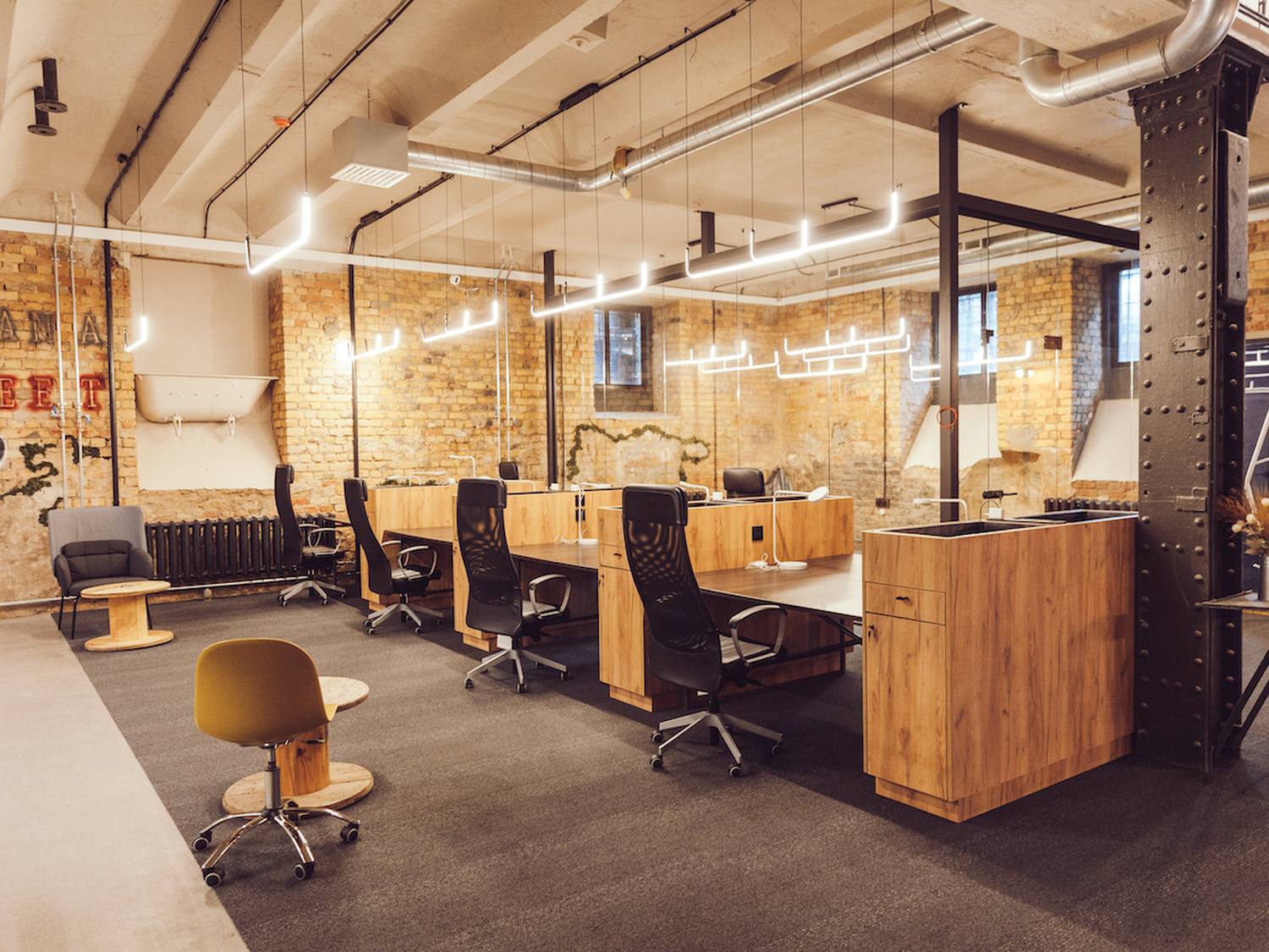 Coworking work zone with desks at Double9 Riga